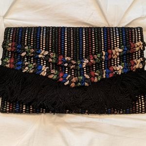 Multi color clutch with fringe